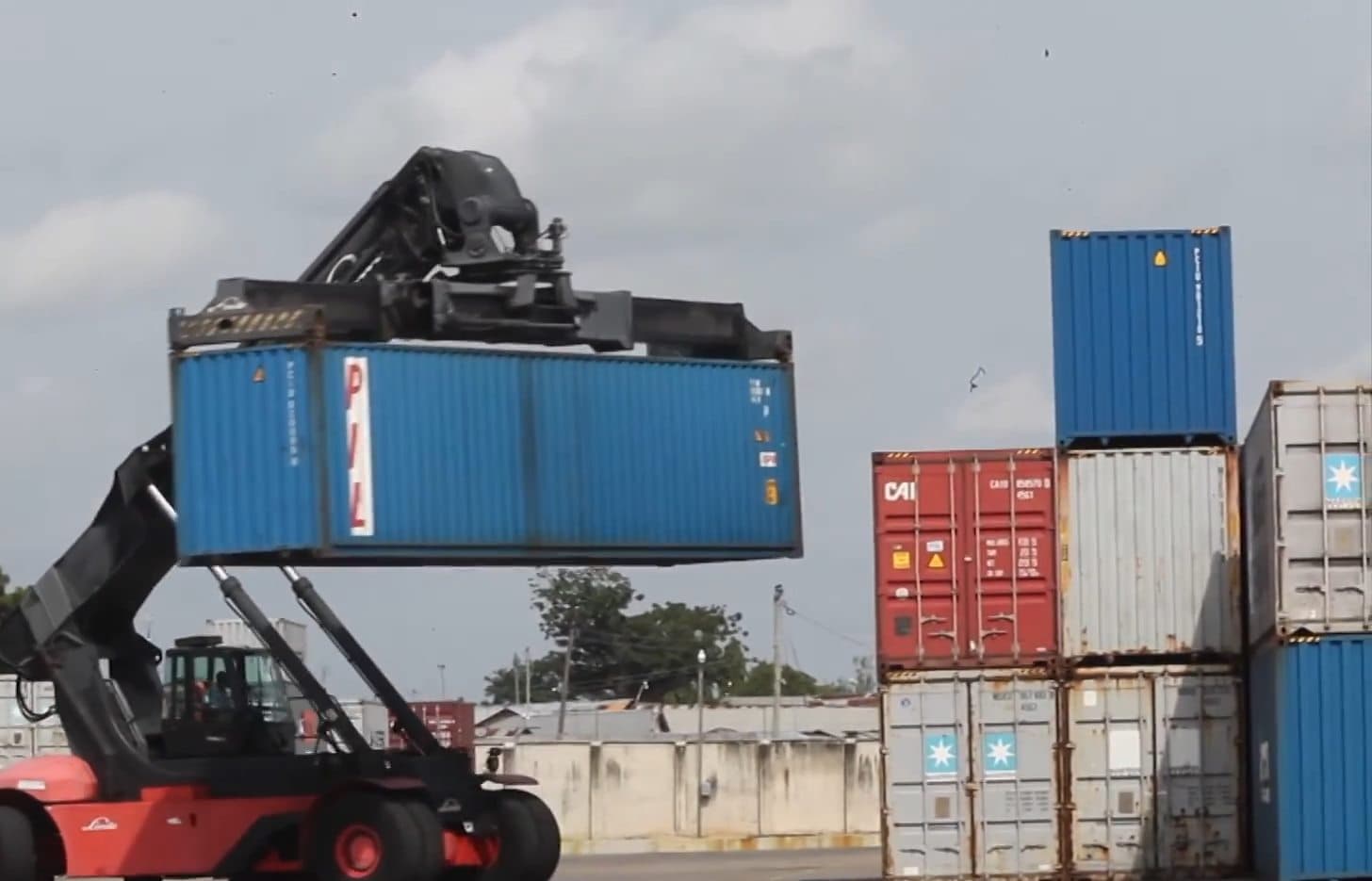 The segregated container storage yard at Focus CFS, Kipevu, with stacked containers and handling equipment.