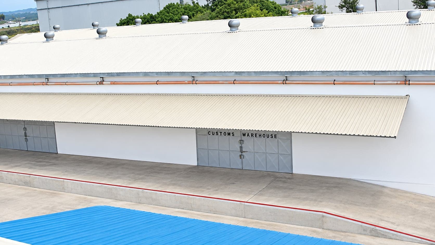 Covered warehouse interior at Focus CFS with palletised loose cargo in storage.